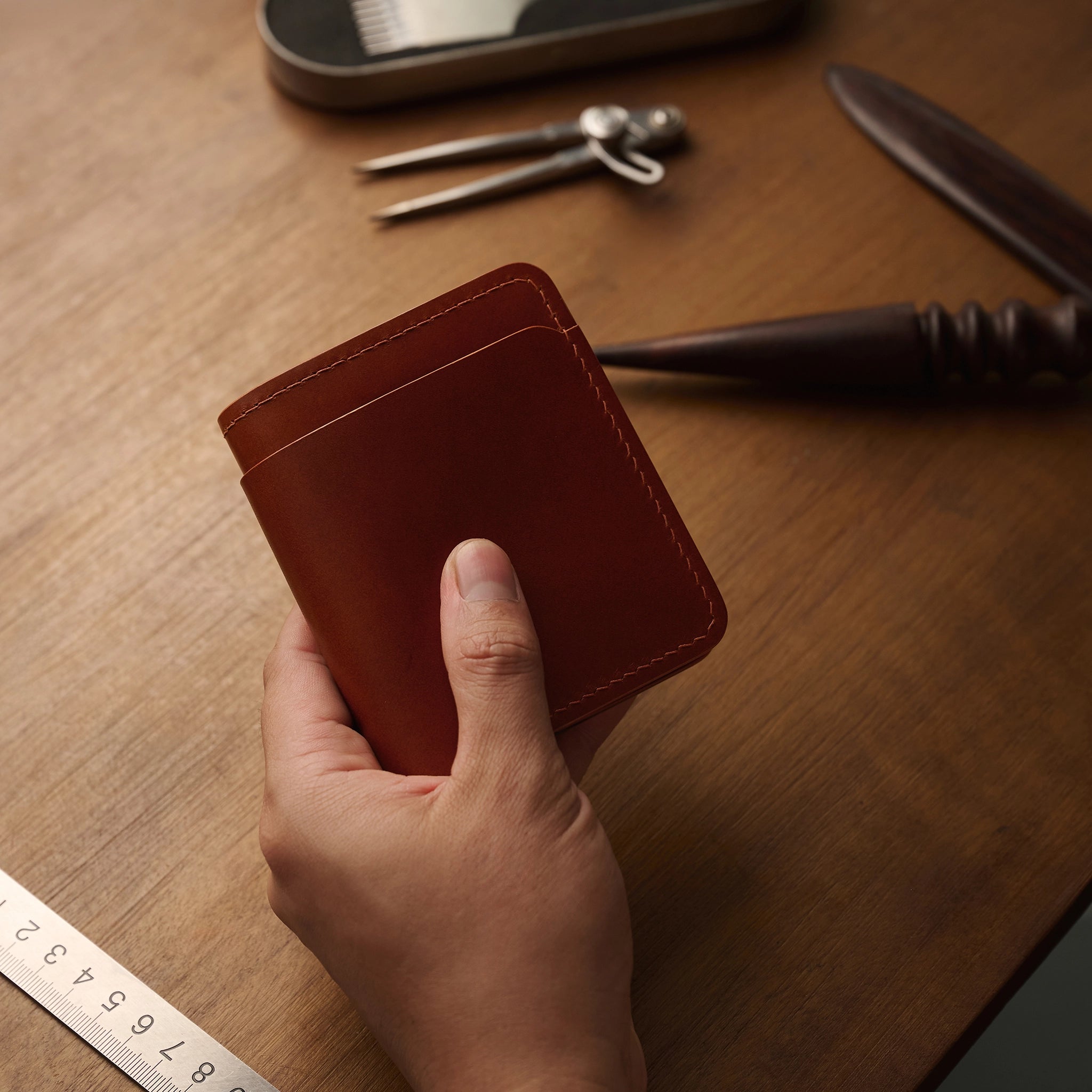 Vertical Buttero Leather Slim Bifold Wallet