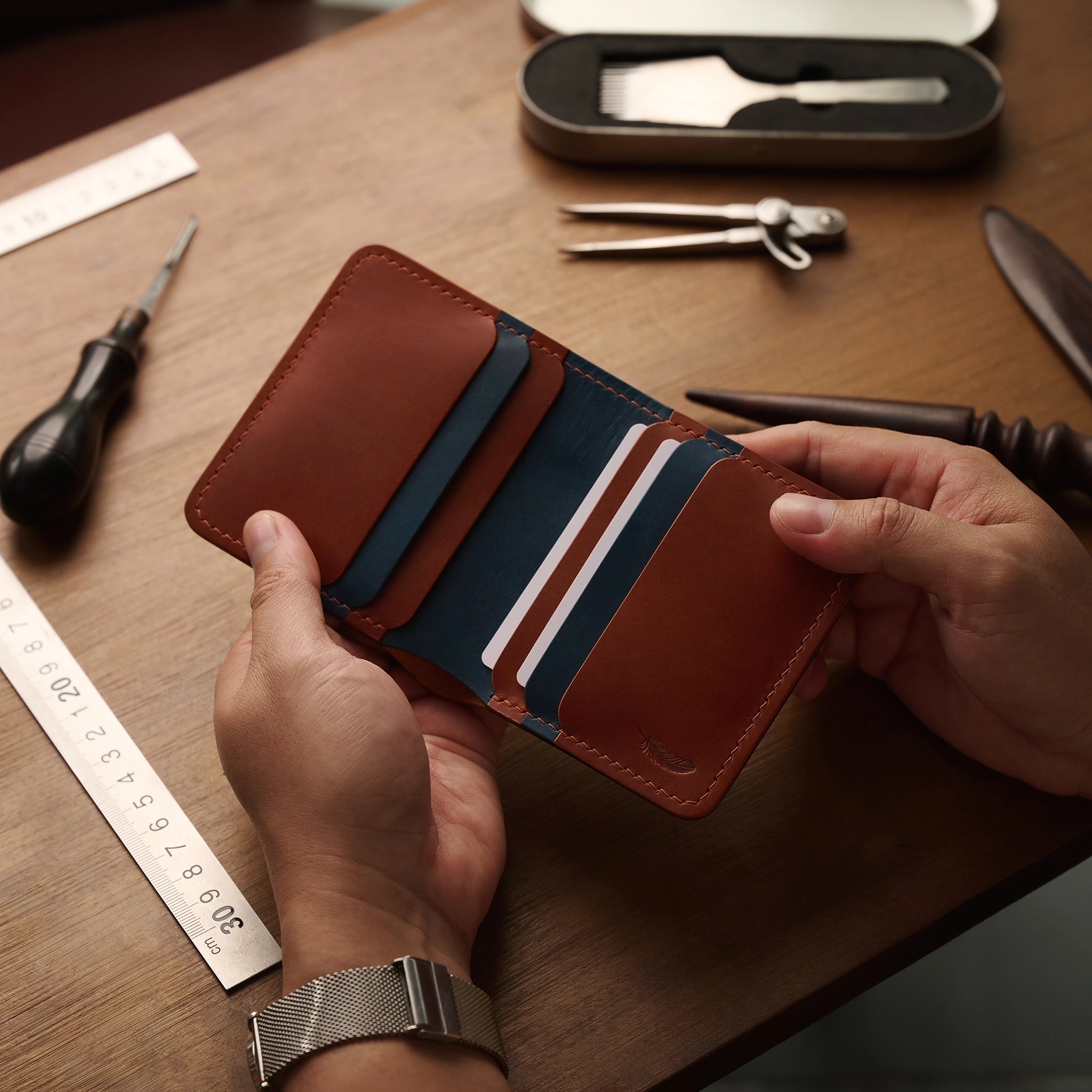 Vertical Buttero Leather Slim Bifold Wallet
