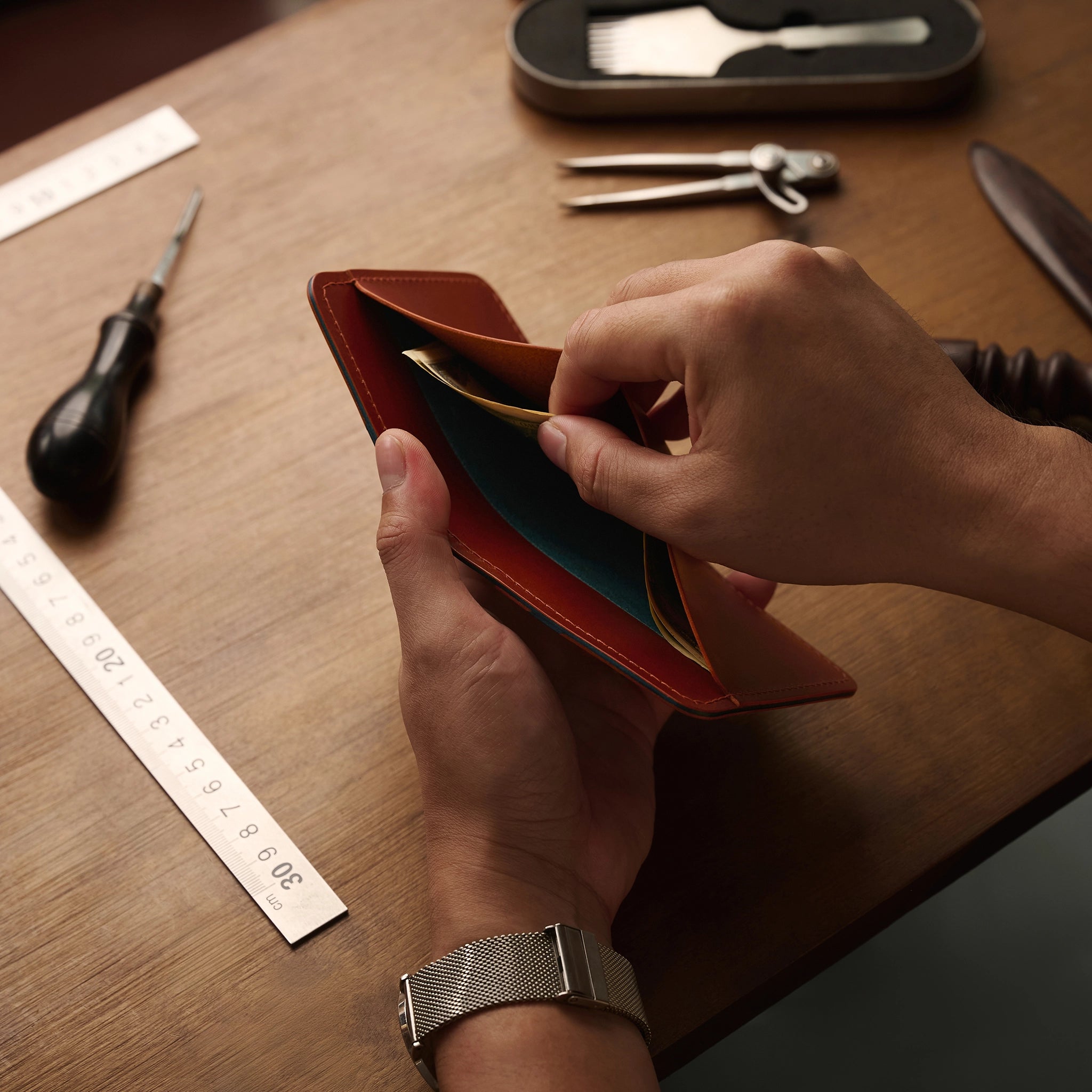 Vertical Buttero Leather Slim Bifold Wallet