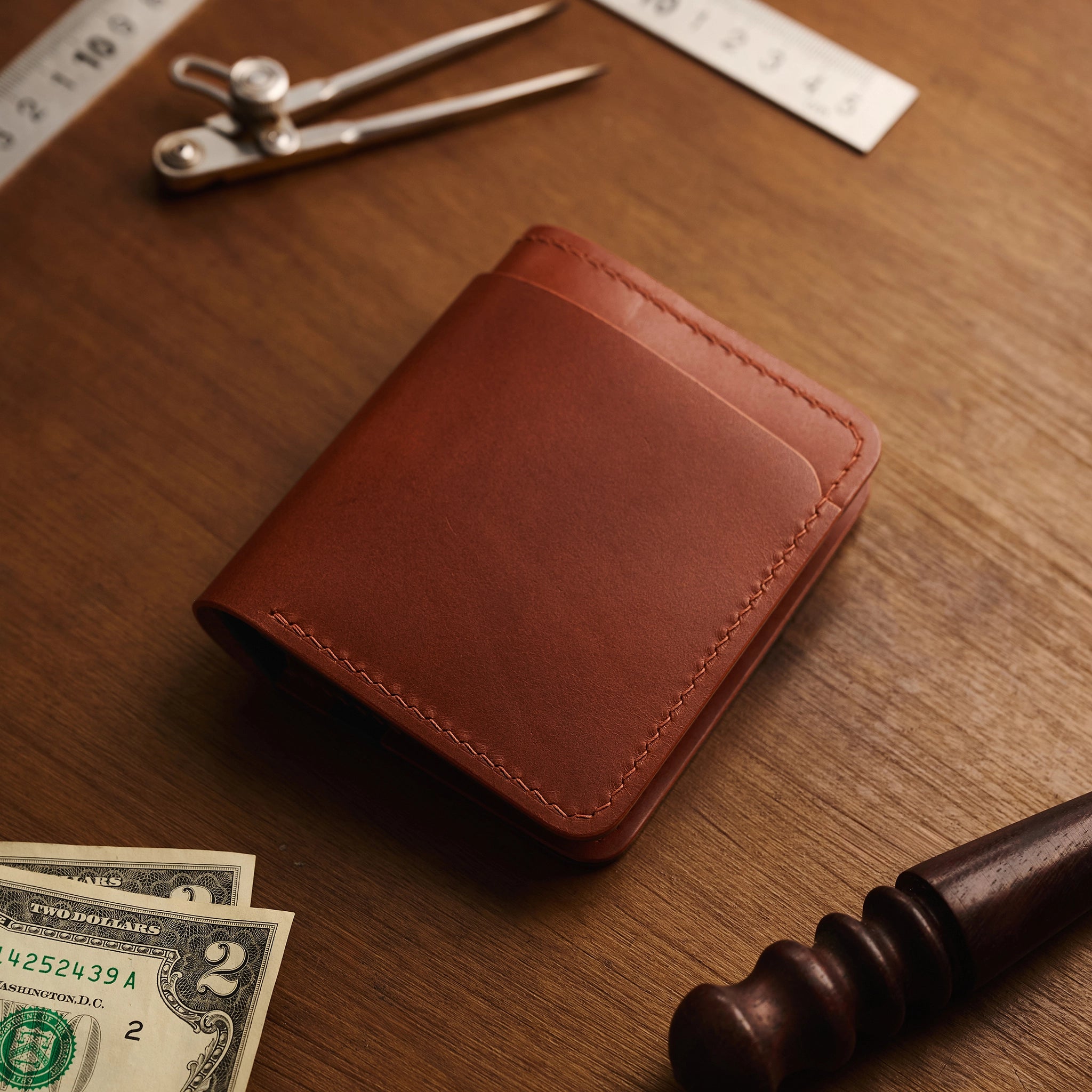 Vertical Buttero Leather Slim Bifold Wallet