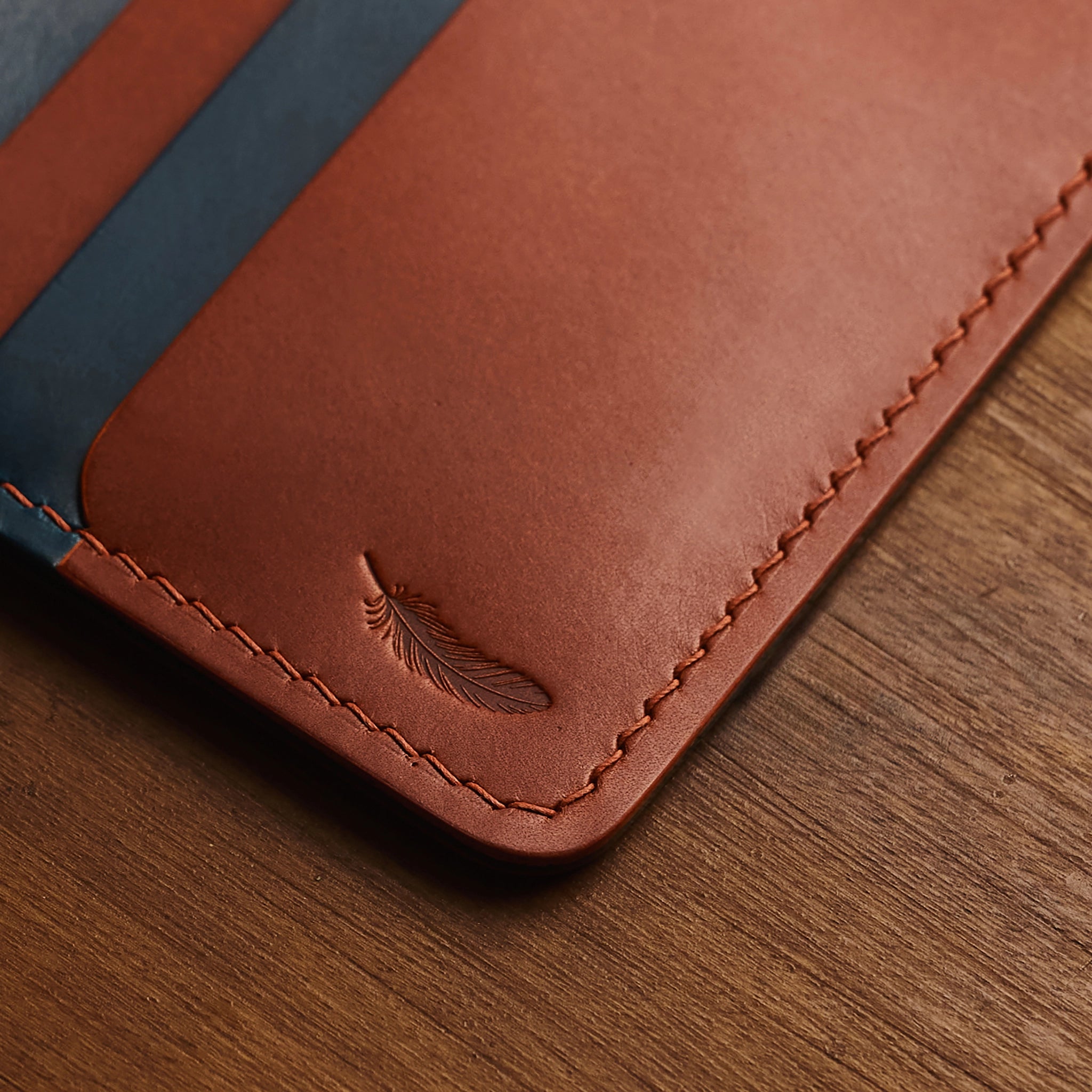 Vertical Buttero Leather Slim Bifold Wallet