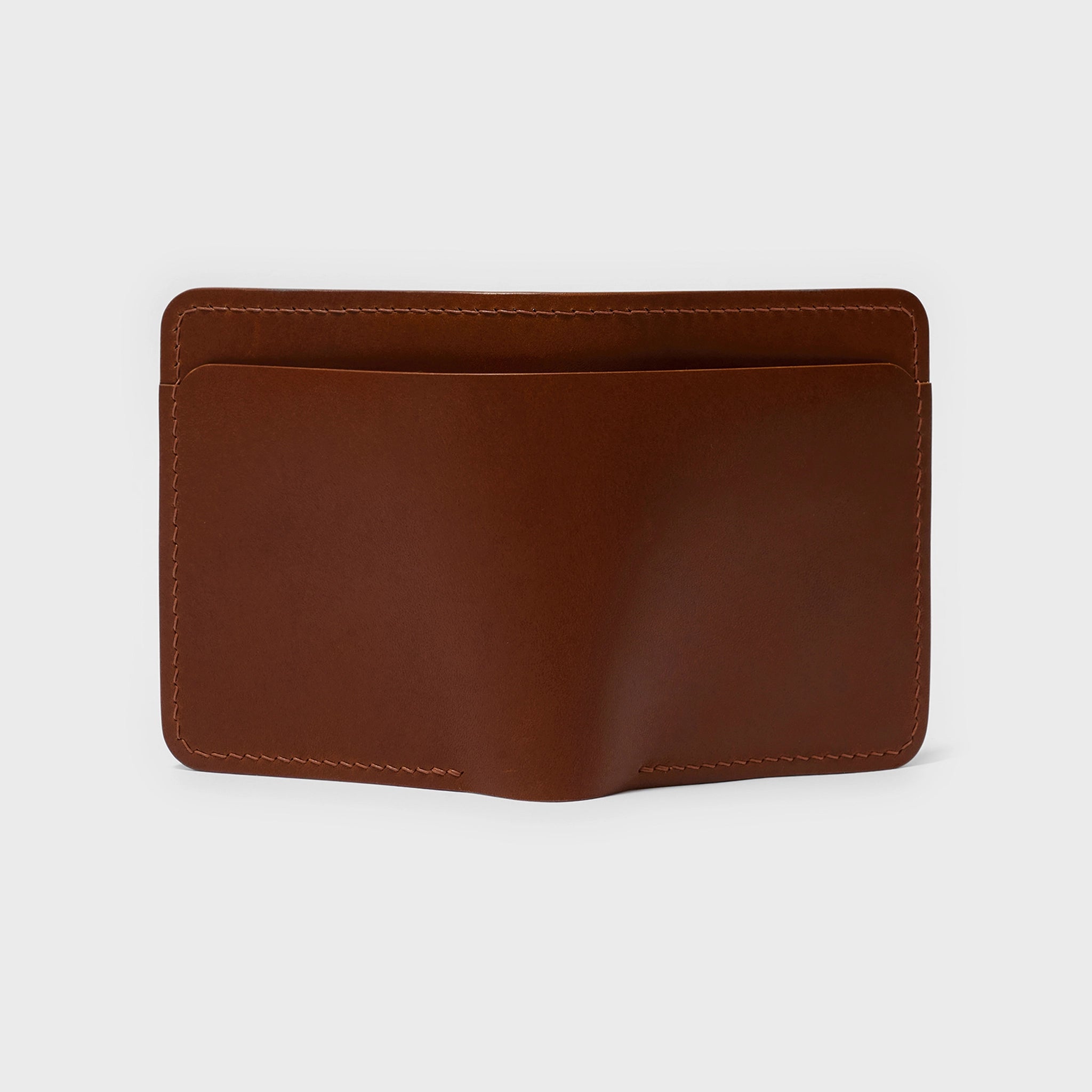 Vertical Buttero Leather Slim Bifold Wallet