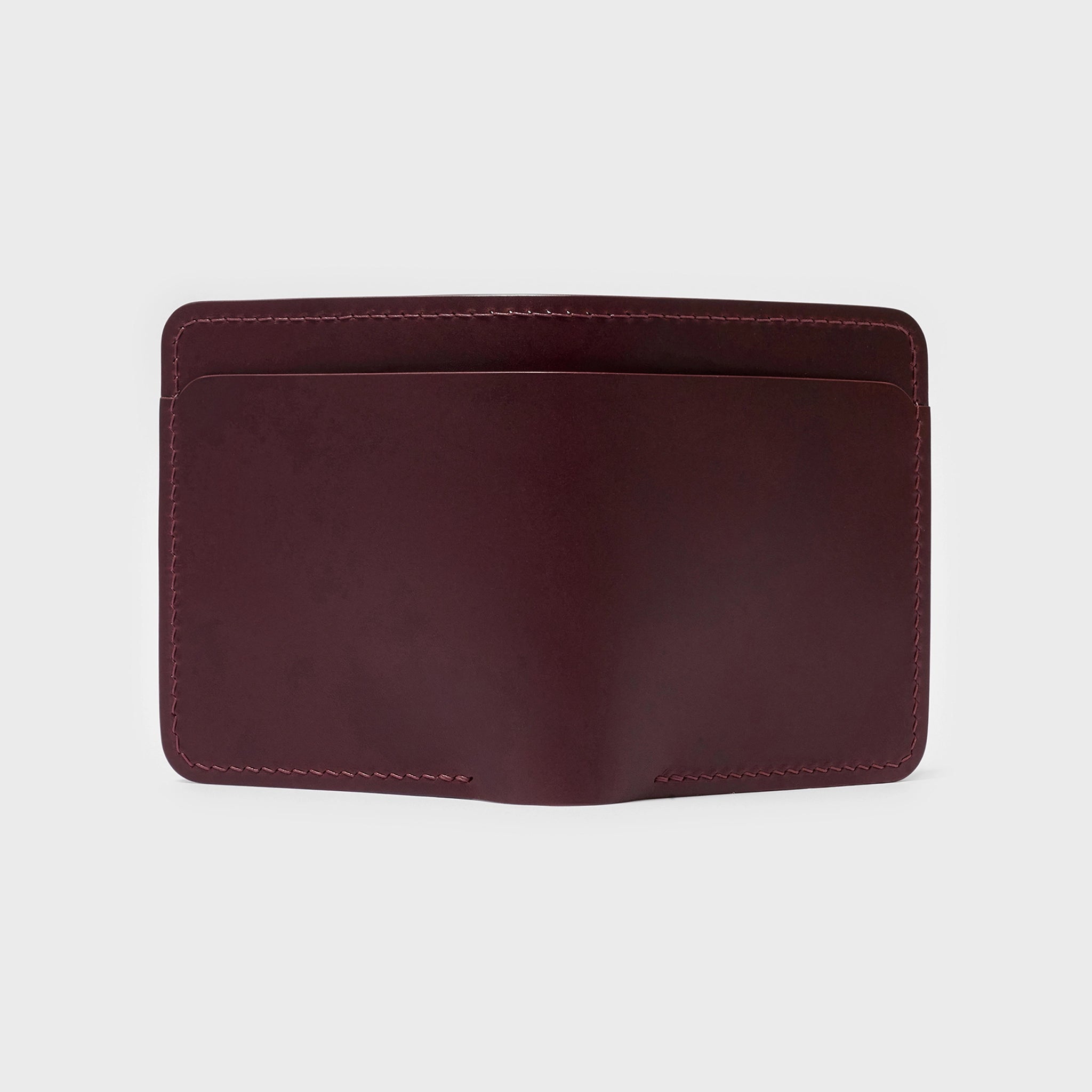 Vertical Buttero Leather Slim Bifold Wallet