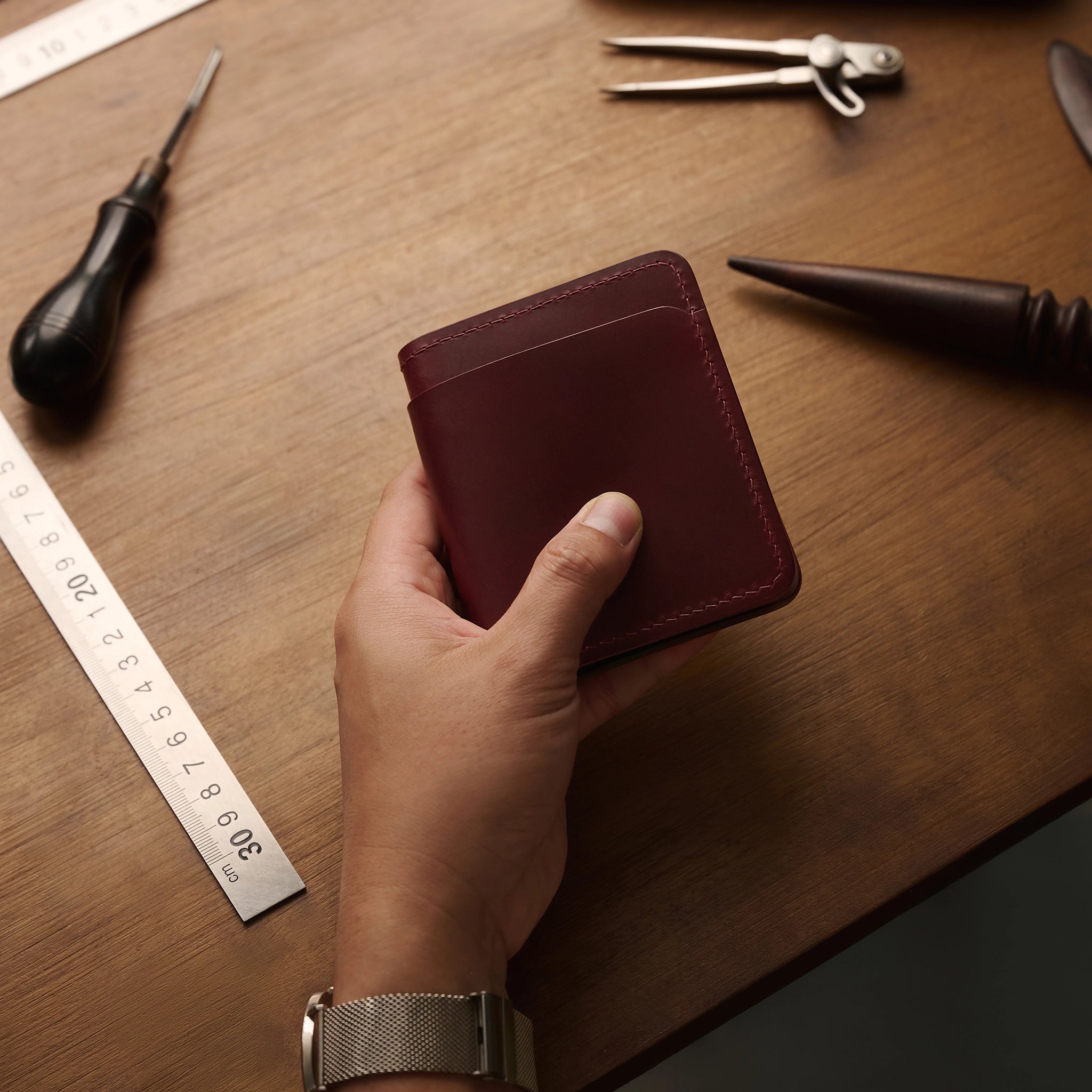 Vertical Buttero Leather Slim Bifold Wallet