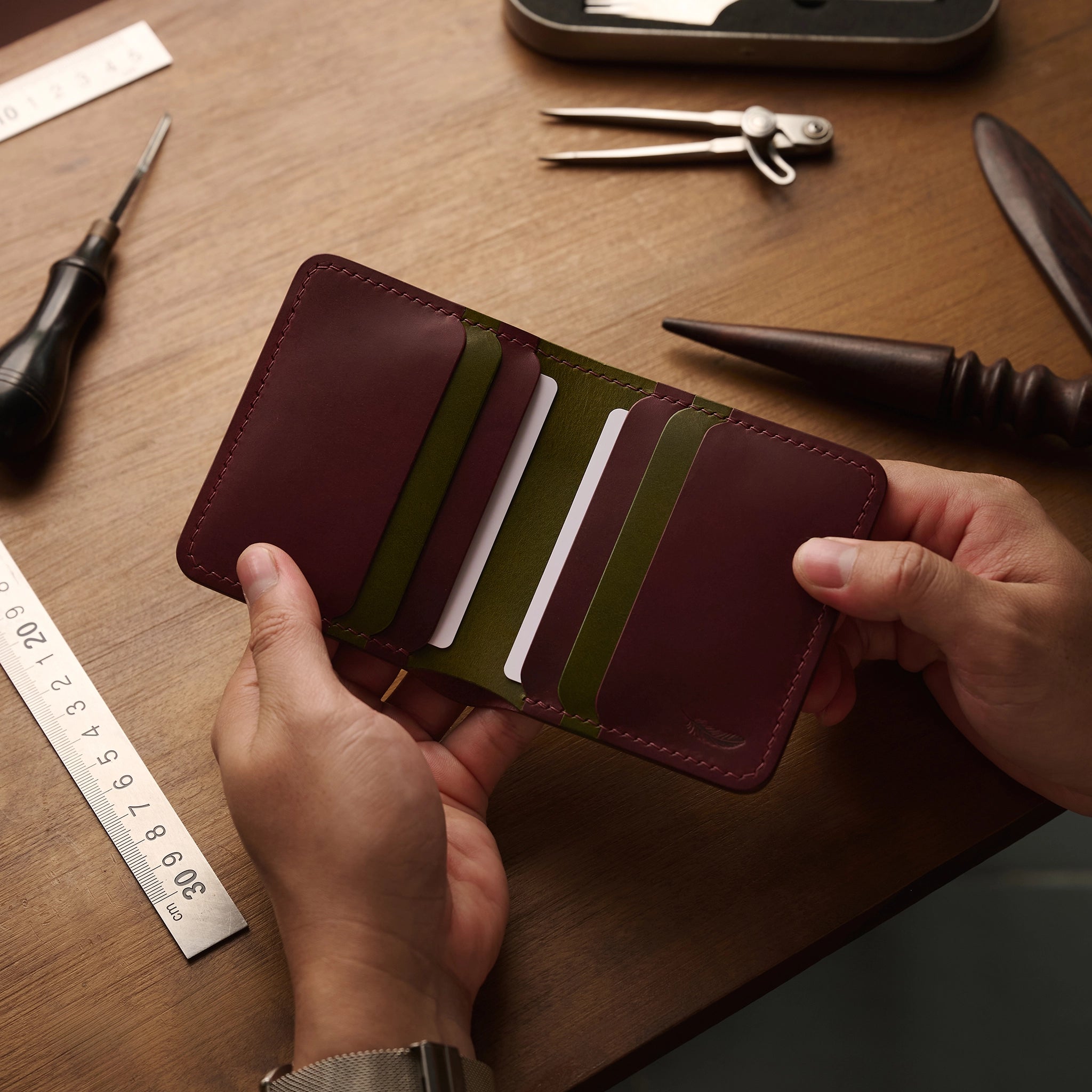 Vertical Buttero Leather Slim Bifold Wallet
