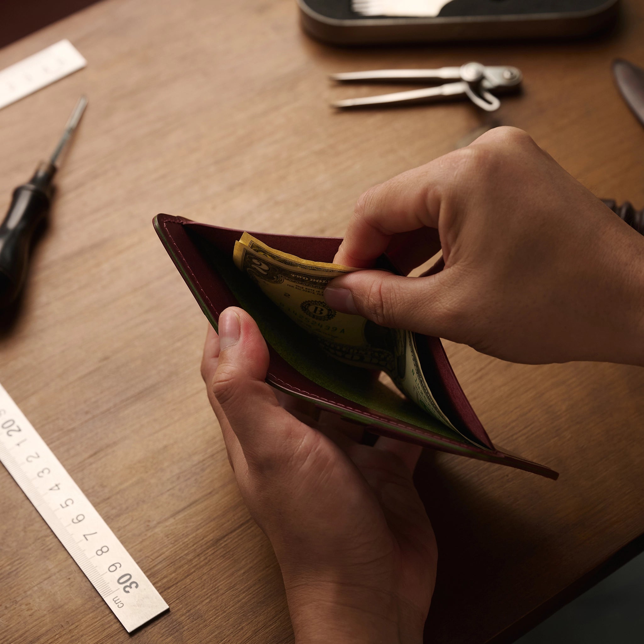 Vertical Buttero Leather Slim Bifold Wallet