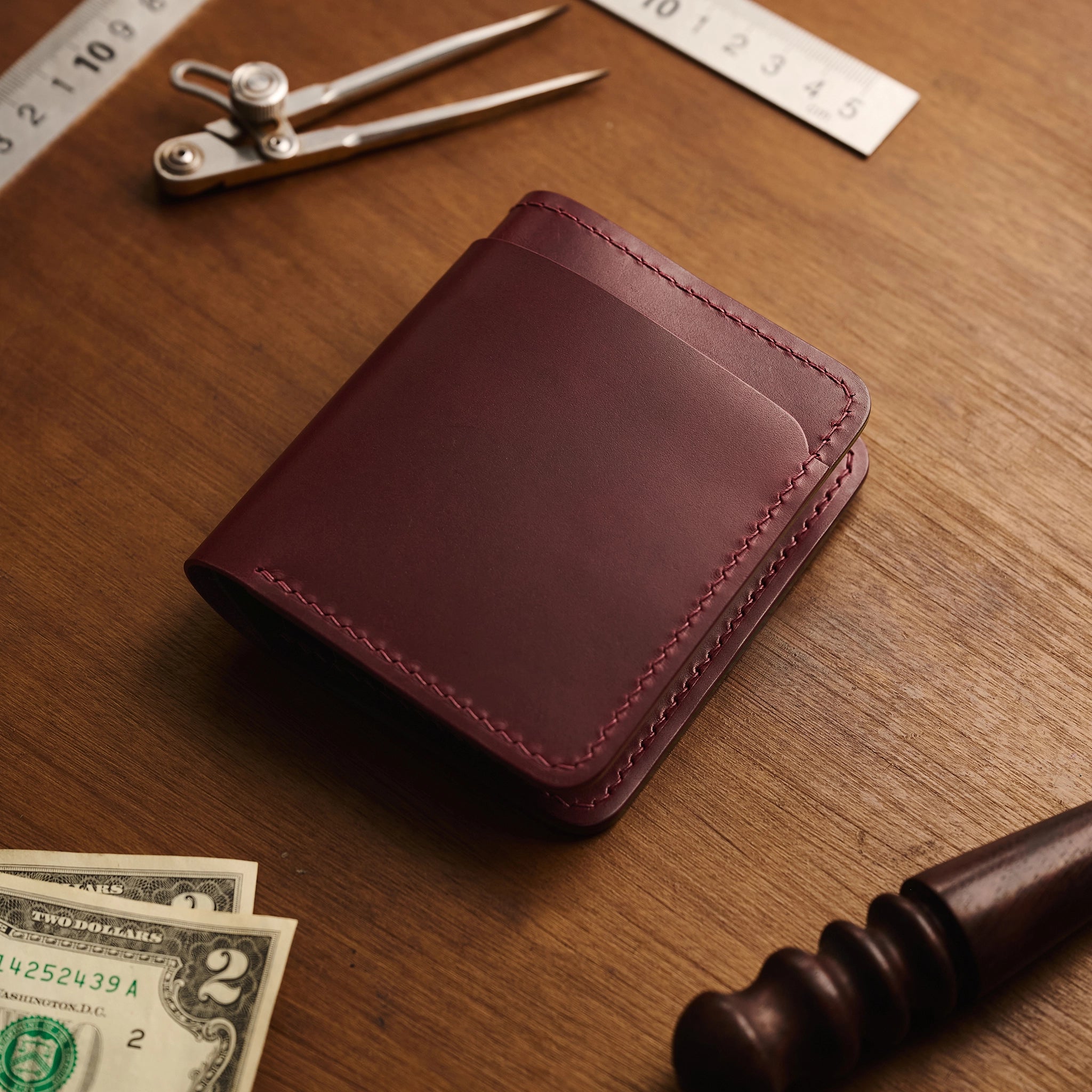 Vertical Buttero Leather Slim Bifold Wallet