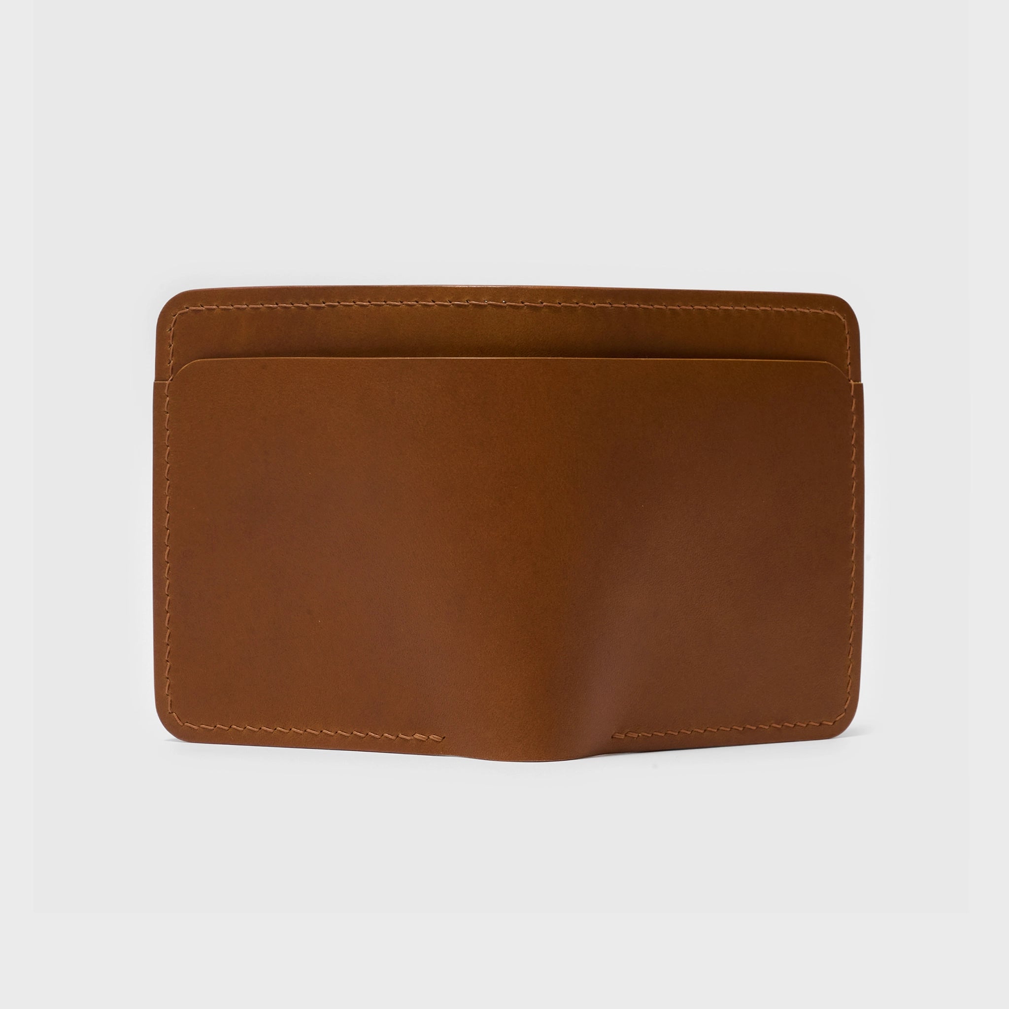Vertical Buttero Leather Slim Bifold Wallet
