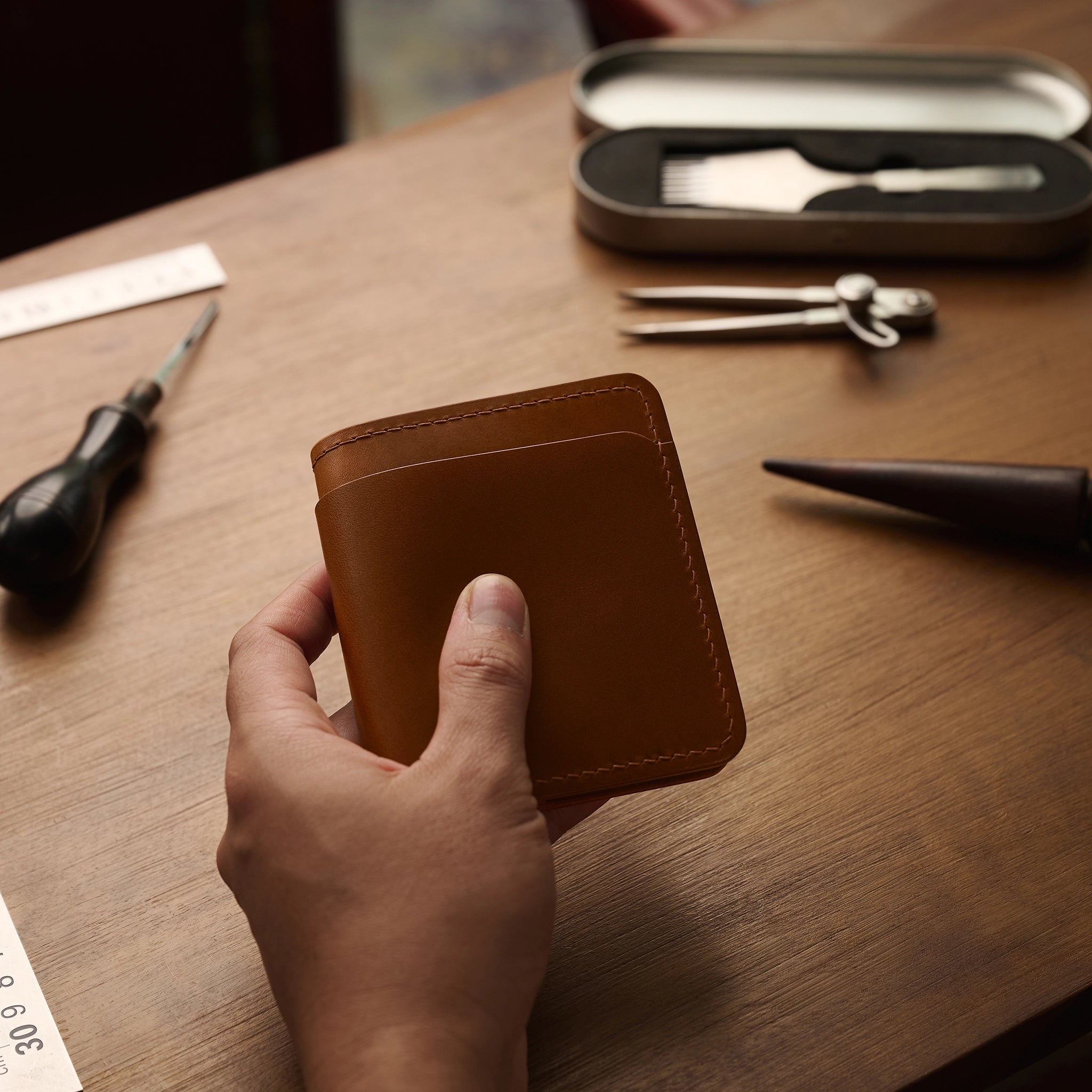 Vertical Buttero Leather Slim Bifold Wallet