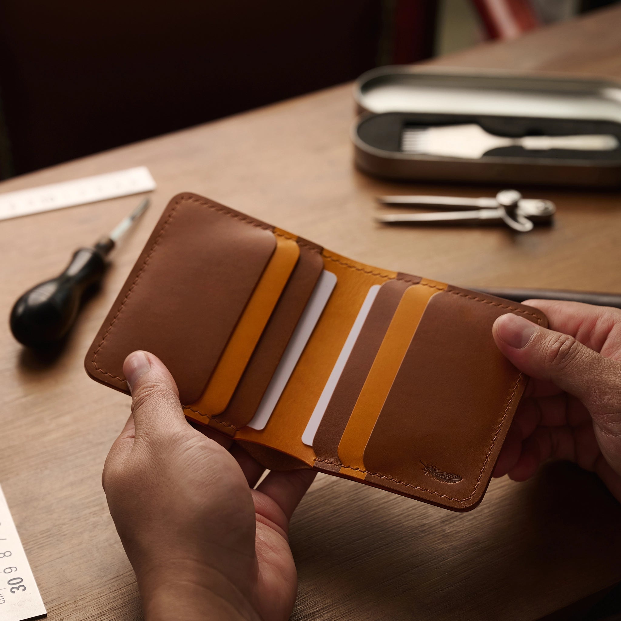 Vertical Buttero Leather Slim Bifold Wallet