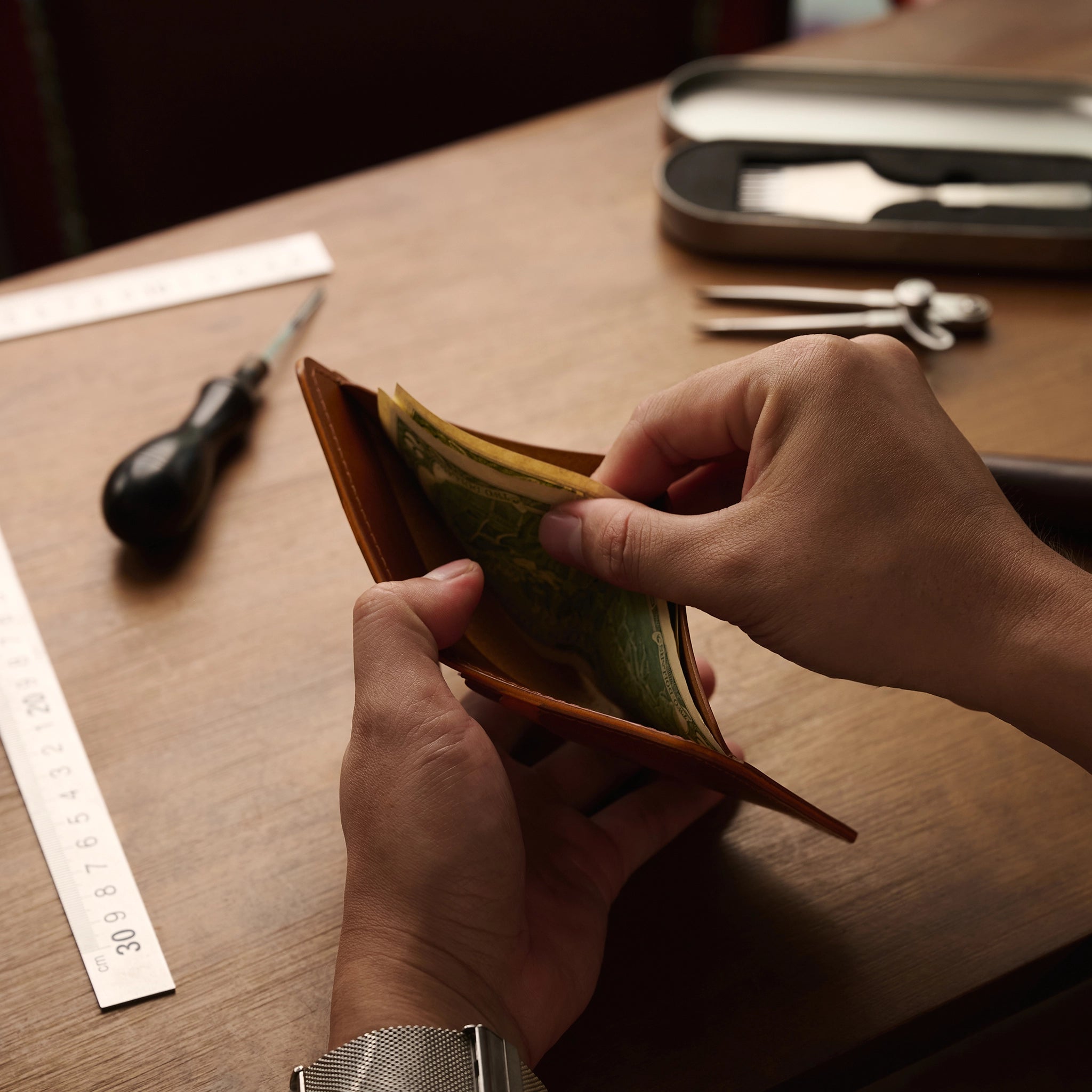 Vertical Buttero Leather Slim Bifold Wallet