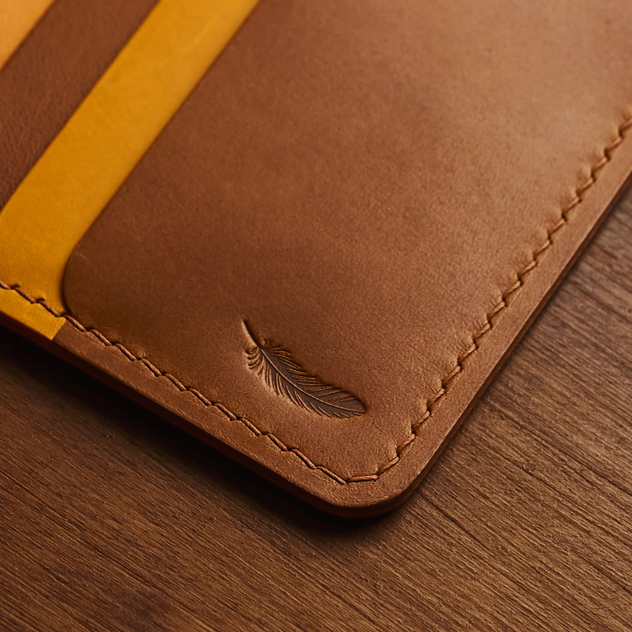 Vertical Buttero Leather Slim Bifold Wallet
