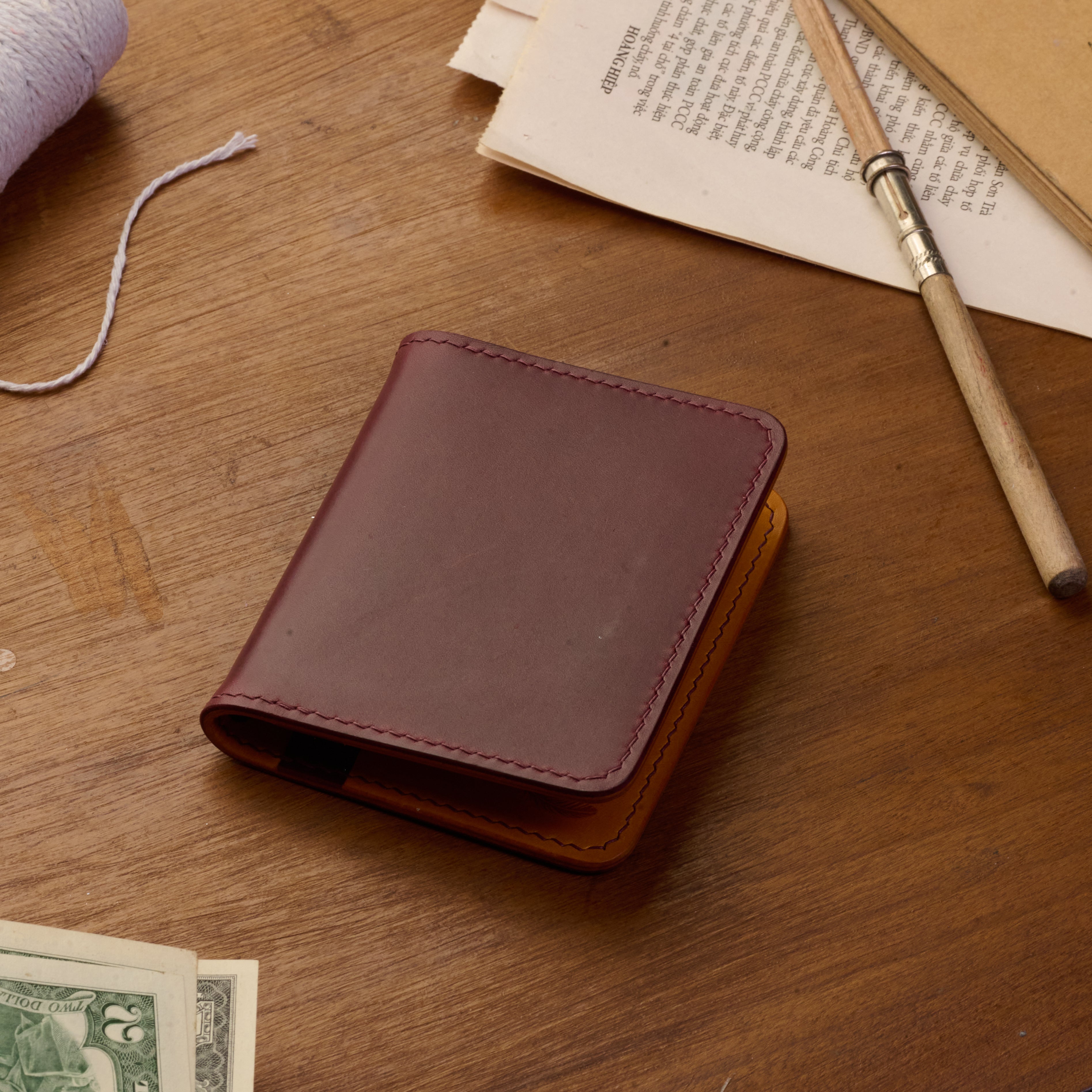 Atelish Vertical Buttero Leather Slim Bifold Wallet