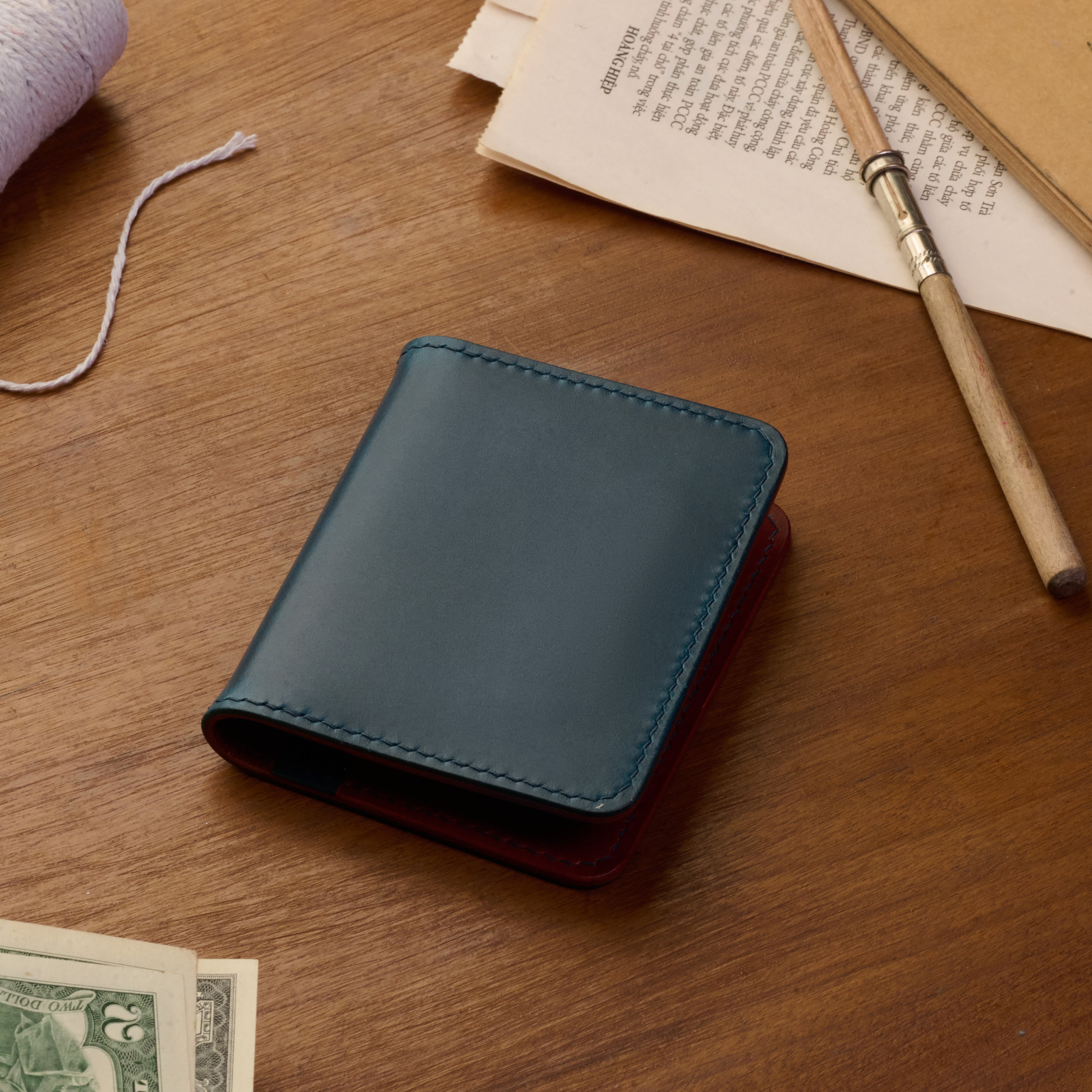 Atelish Vertical Buttero Leather Slim Bifold Wallet