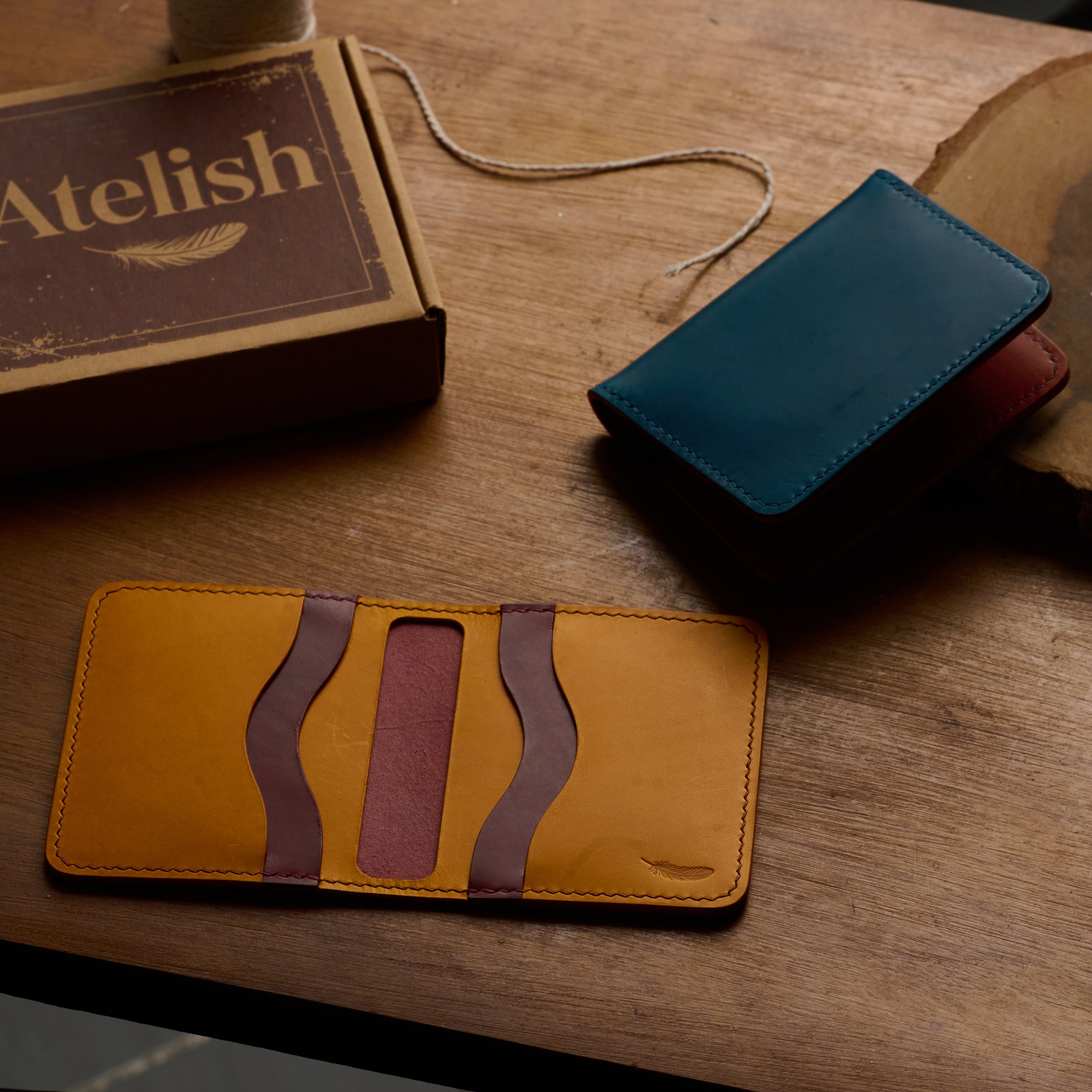 Atelish Vertical Buttero Leather Slim Bifold Wallet